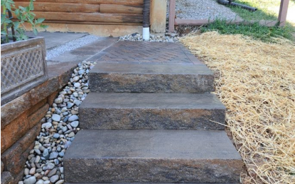 custom stone steps with gravel channel
